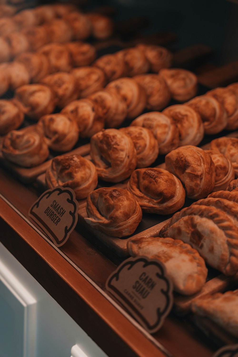 Stock photo of a bakery case full of pastries